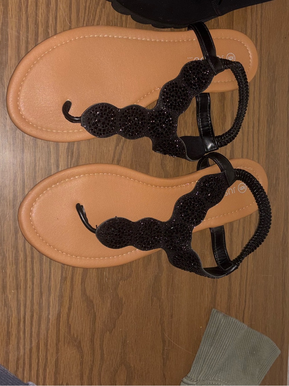 Tan and black sandals